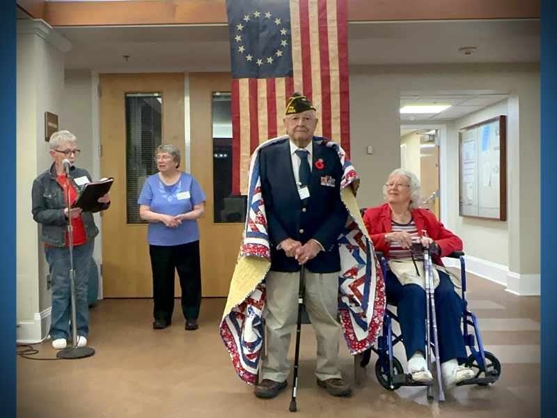PHOTOS: A quilt stitched with gratitude – Des Moines Veteran Pat Nardo receives ‘Quilt of Valor’